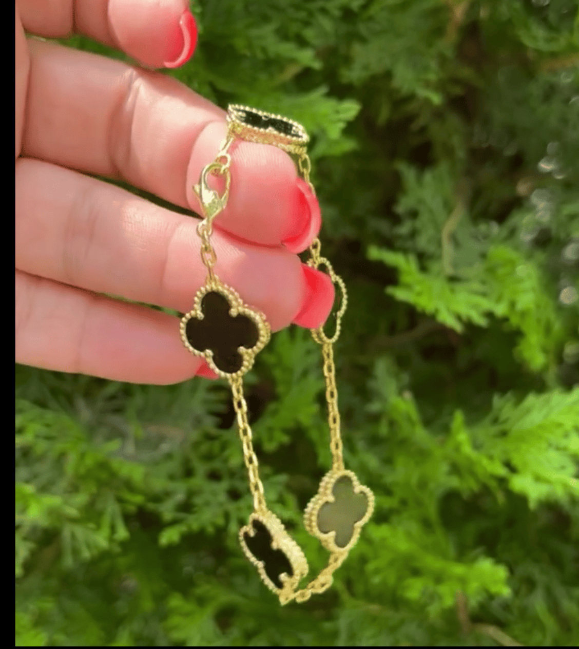 VC black and gold bracelet